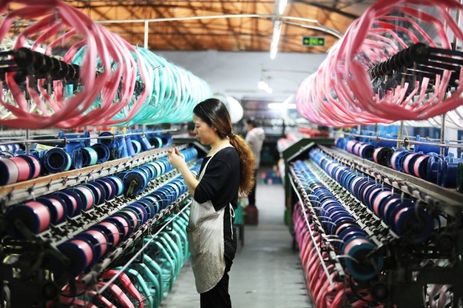 Title: Chongqing Textiles Manufacturing and Wholesale: A Hub of Innovation and Quality