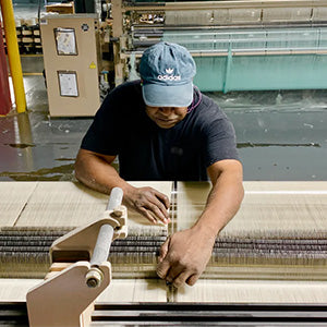 The Weaving Factory Loom Operator