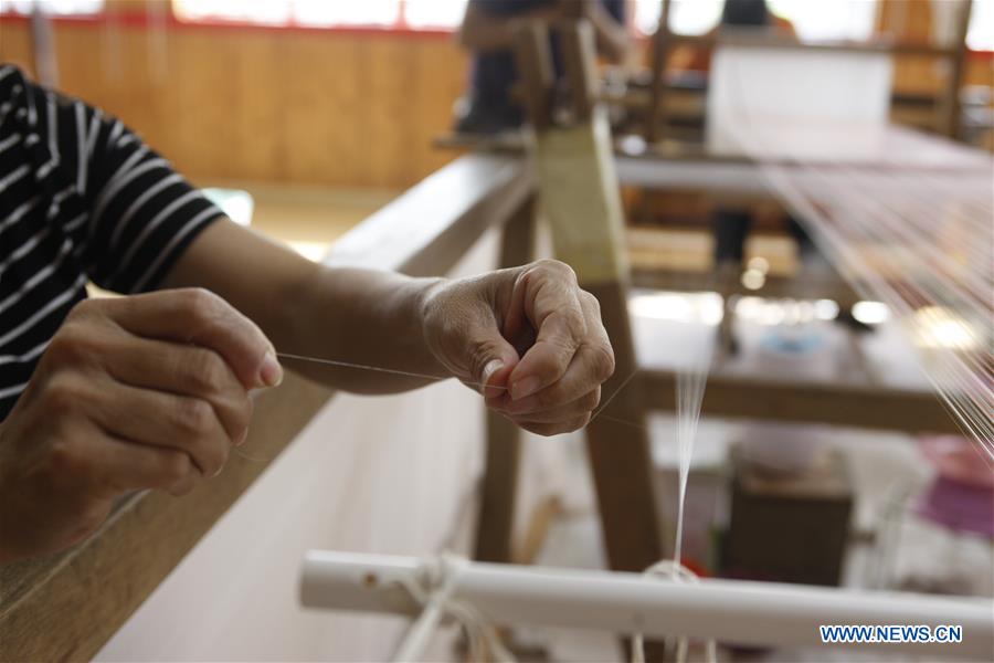 Title: Xiangyun Knitting Mill - Crafting Tradition with Creativity