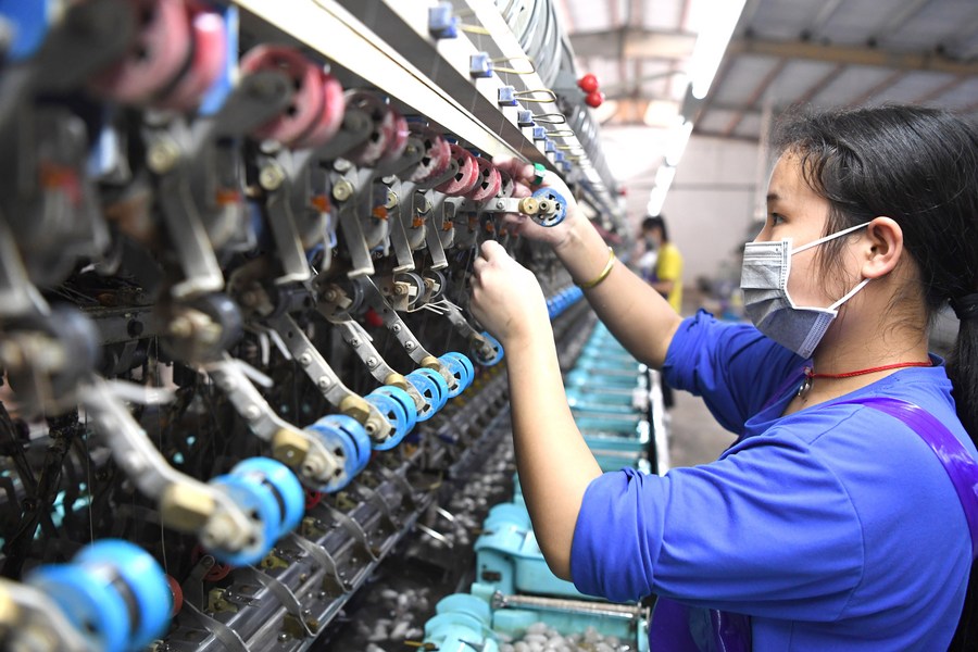 Title: Mao Zhuang Textile Factory: A Look Inside the Lives of Its Workers