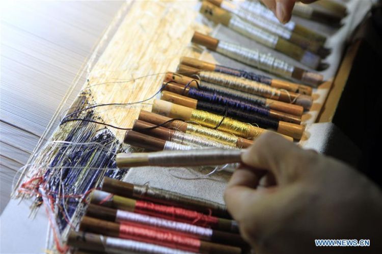 Experience the Beauty of Lixian Yinu Textile Store: A Masterpiece of Chinese Craftsmanship