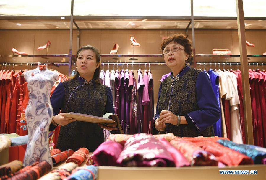 Experience the Beauty of Lixian Yinu Textile Store: A Masterpiece of Chinese Craftsmanship