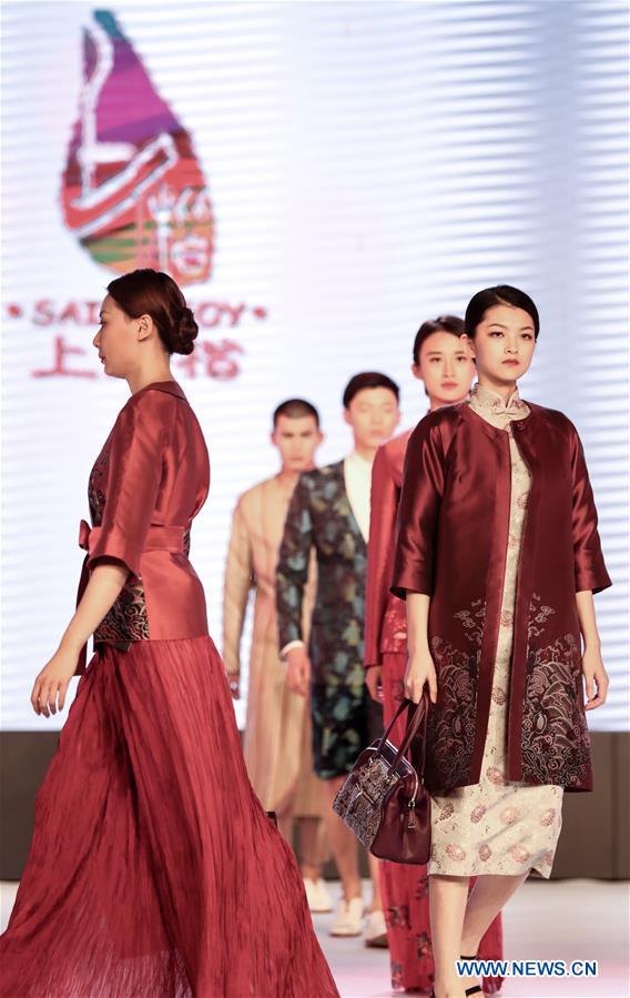 Title: The Evolution of Jiangsu Textile Brands: From Traditional Craftsmanship to Modern Fashion Awards