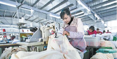 Title: Weaving Her Dream: The Story of Textile Factory Worker Huanhuan