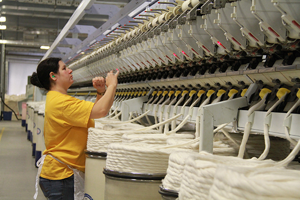 Title: Disabled Workers in a Textile Mill