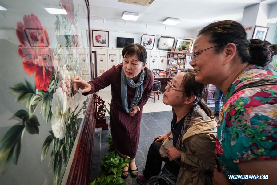 Title: The Art of Suzhou Handicraft Textile Mirrors: A Cultural Legacy