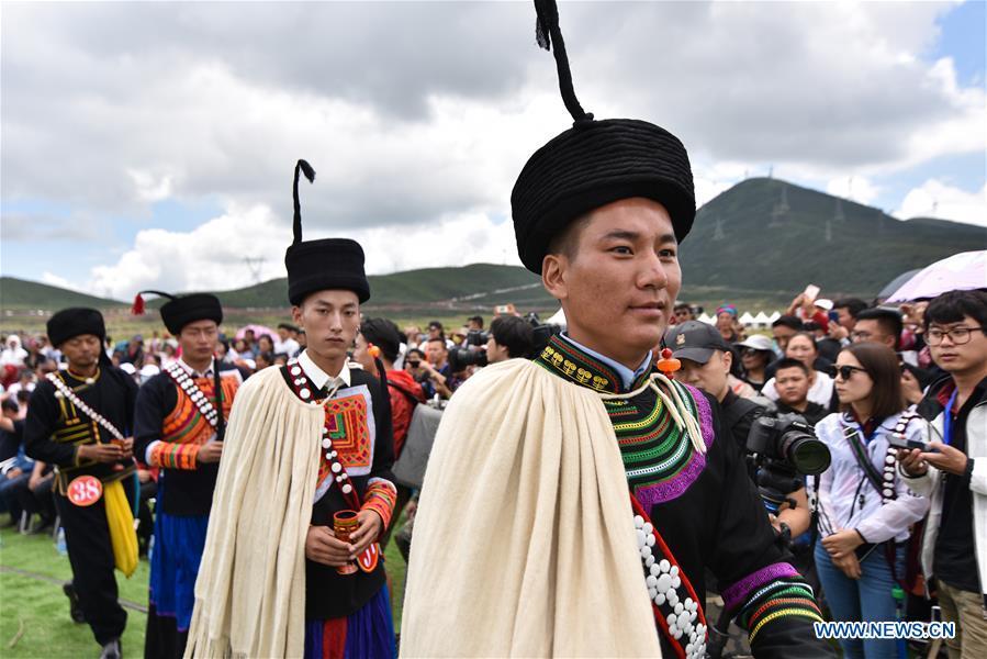 Title: Yunnan Zhuang Embroidery: An Ode to the Rich Cultural Heritage of the Yi and Miao Communities